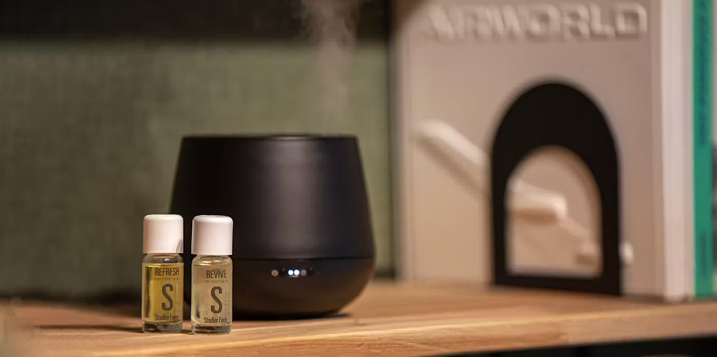 Stadler Form Julia aroma diffuser on a bookshelf