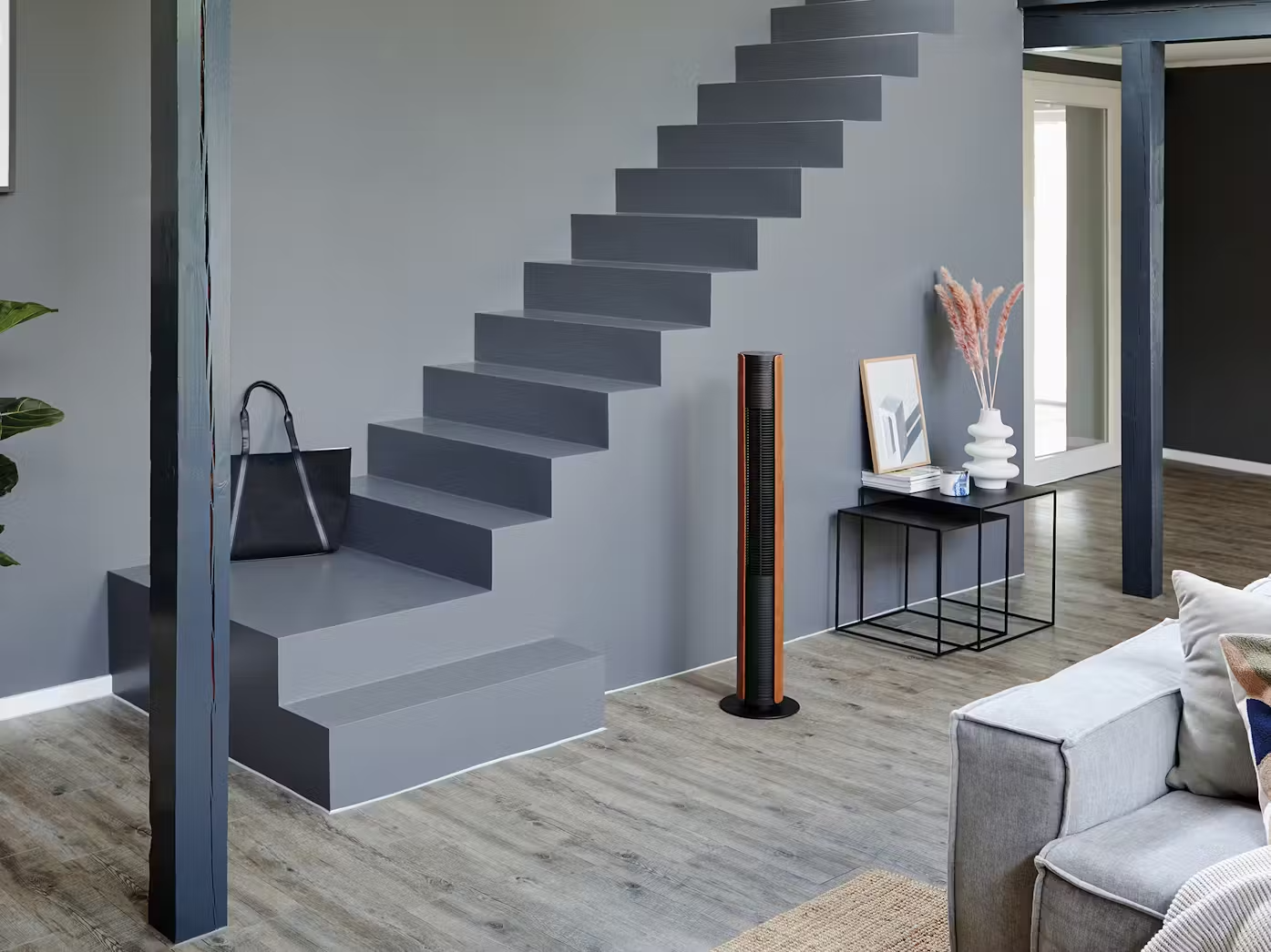 Stadler Form Peter leatherette tower fan in a stylish modern living area